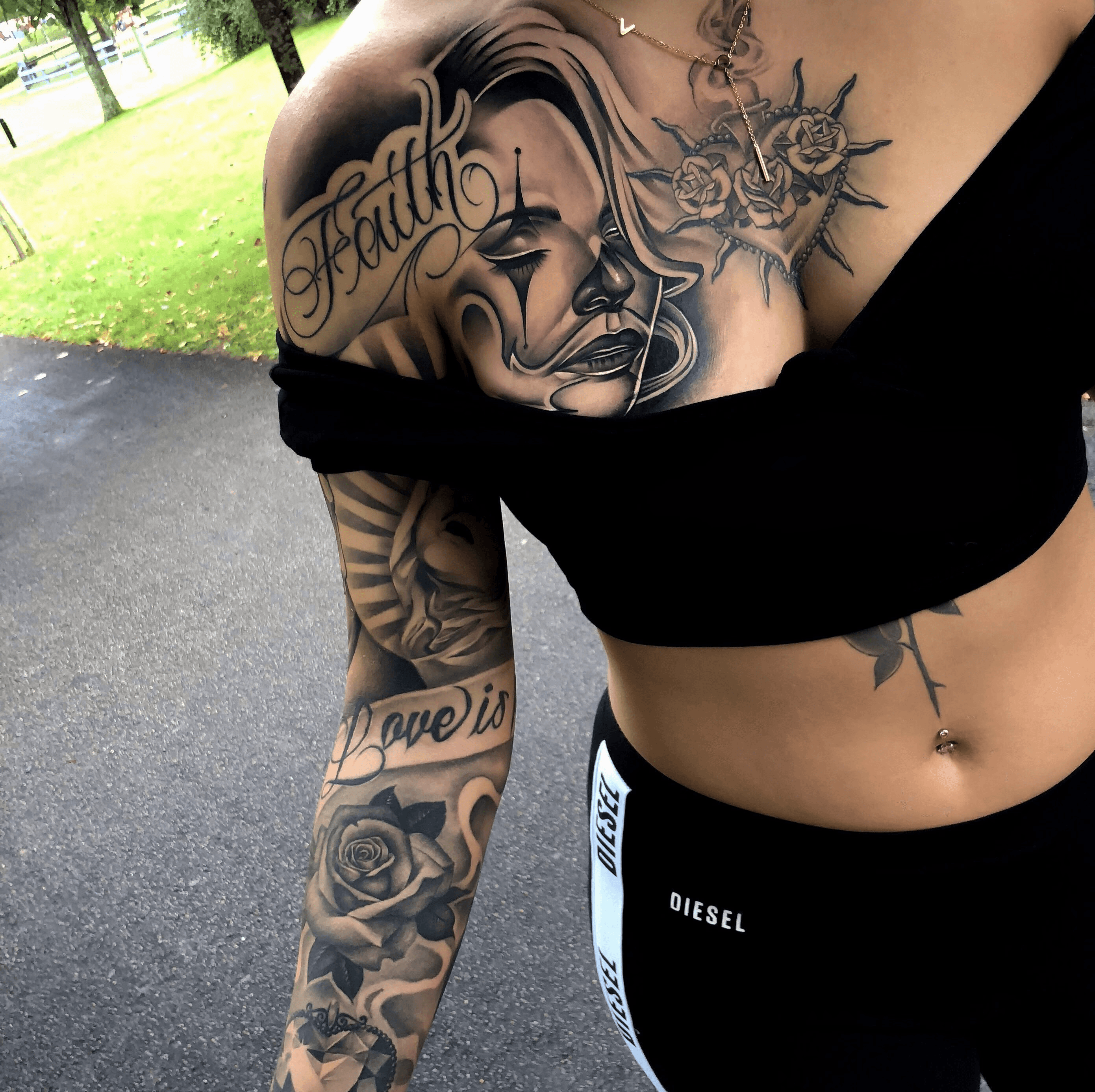 Chicano black and grey chest piece with Faith script, clown girl face and rose heart